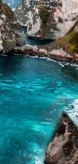 Serene coastal view with turquoise water and cliffs.