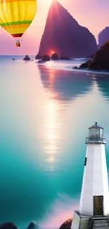 Lighthouse and hot air balloon at sunset by the ocean.