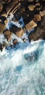 Aerial view of ocean waves crashing on rocky coast.