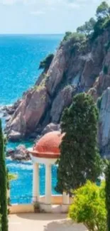 Scenic coastal view with turquoise water and rocky cliffs.