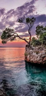 Scenic ocean sunrise with vibrant sky.