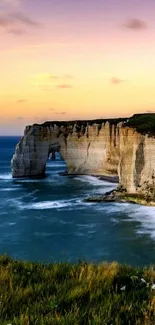 Scenic sunset over coastal cliffs with ocean waves capturing nature's tranquility.