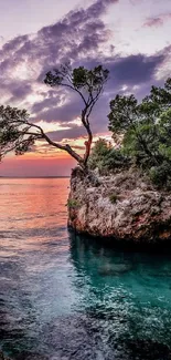 Serene coastal sunset with vibrant sky and tranquil sea.