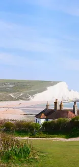 Serene coastal landscape with cliffs and lush green scenery.