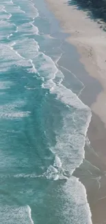 A soothing coastal scene with gentle waves and sandy beach.