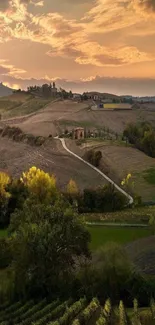 Golden sunset over serene countryside landscape with rolling hills.