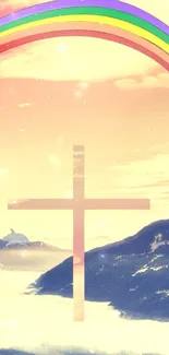 Serene wallpaper with cross and rainbow over mountains and a pastel sky.