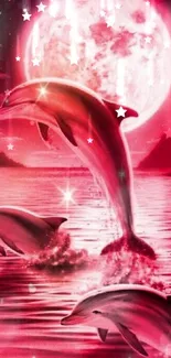 Dolphins gracefully leaping under a red moonlit night sky on serene waters.