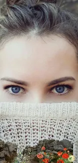 Captivating blue eye portrait with knitted sweater and beige tones.