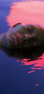 Artistic serene face floating in water with vibrant colors.