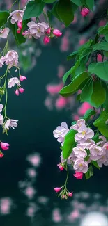 Elegant green leaves and pink blossoms wallpaper.