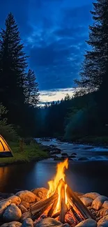 A glowing campfire by a riverside tent in a serene forest at dusk.