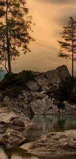 Serene lake and trees at sunset.