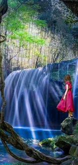 Woman in pink dress by a serene waterfall in a lush green forest landscape.