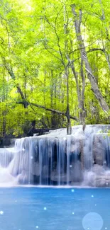 Serene waterfall in lush green forest wallpaper.