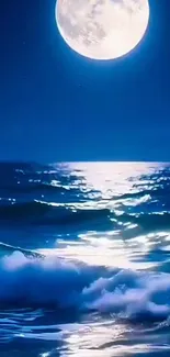 Full moon reflecting on tranquil ocean waves at night.