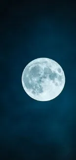 Full moon in deep blue night sky wallpaper.