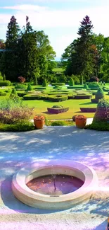 High-resolution garden wallpaper with green landscape and central fountain.