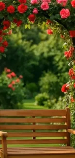 Wooden bench under a rose arch in a tranquil garden.
