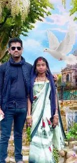 Couple standing in a romantic garden with a dove flying overhead.