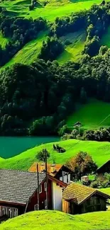 Green hills and rustic houses with a serene lake in the background wallpaper.