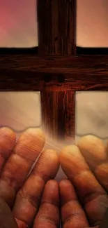 Praying hands under a rustic wooden cross wallpaper.