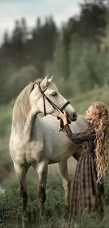 Woman with long hair gently holds a white horse in a green natural setting.