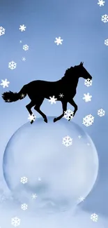 Horse silhouette on a glass sphere with a serene blue background.