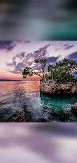 Serene island at twilight with colorful sky and calm ocean.