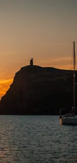 Serene sunset with sailboats at Isle of Man.