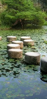 Serene Japanese garden with a stone pathway over a lily pond.