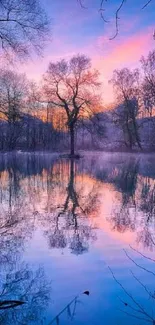 Serene lake at dusk with reflections and vibrant sky.