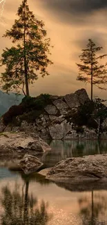 Serene lake scene with rocks and trees at dusk, under a dramatic sky.