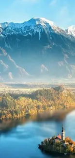 Serene lake island with mountains and autumn trees.