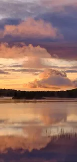 Serene sunset over a calm lake reflecting colorful skies.