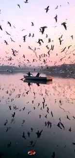 Boat and birds at sunset on a peaceful lake.