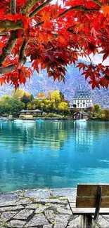 Scenic autumn view with red leaves and tranquil lake.