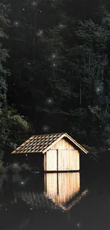 Wooden cabin reflected on a calm lake at night.