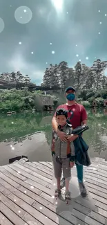 Father and son at peaceful lakeside with trees and sky.