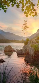 Serene sunset over a lakeside with lush greenery and tranquil waters.