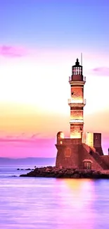 Tranquil lighthouse silhouetted at sunset with vivid purple and pink sky.