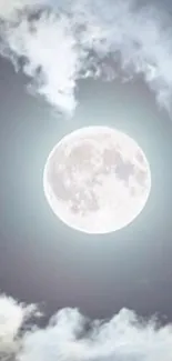 Full moon amidst clouds in a serene night sky.