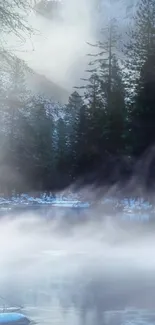 Misty forest by a tranquil lake with trees and a mountain.