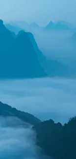 Misty mountain landscape in calming blue tones