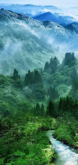 Misty green mountain landscape wallpaper with a serene stream.