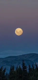 Full moon over mountains with purple sky