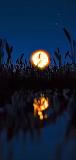 Glowing full moon with silhouettes at night, reflecting in water.