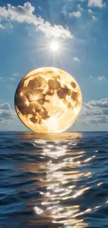 Moon reflecting on ocean under blue sky.