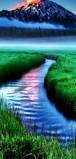 Serene mountain and green landscape with stream.