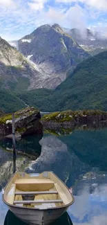 Serene lake with boat and mountains in stunning wallpaper.